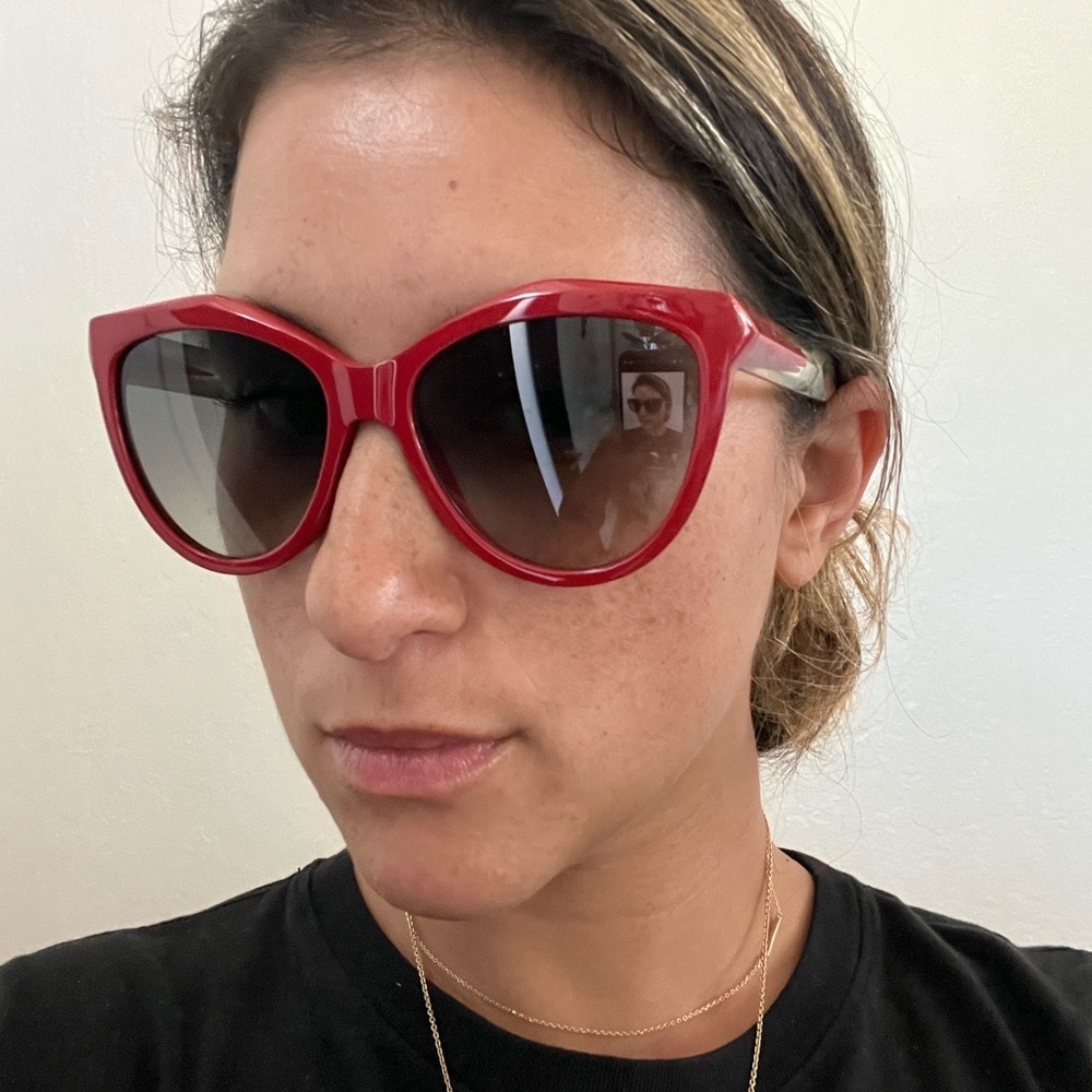 Givency  by cat eye sunglasses in true red